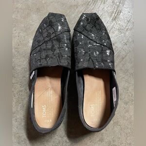 Tom’s black sequin classic slip on flats